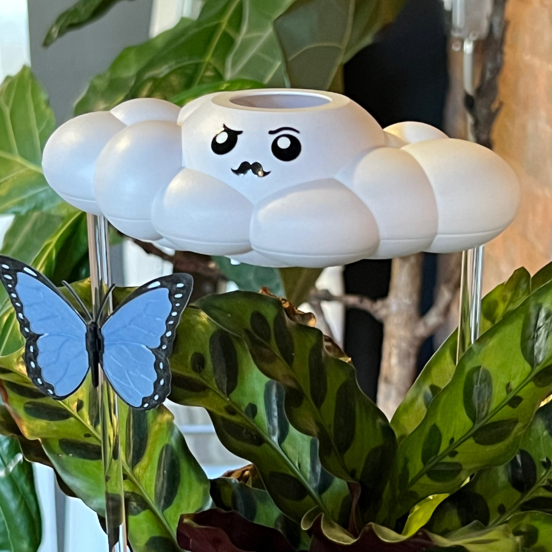 Carl the Cloud with blue butterfly charm