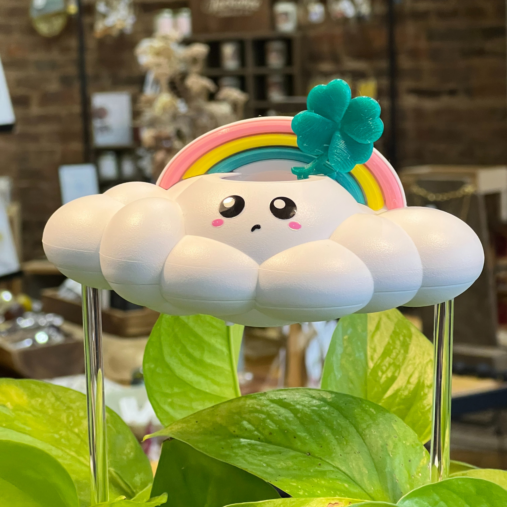 Colby The Cloud with clover and pastel rainbow