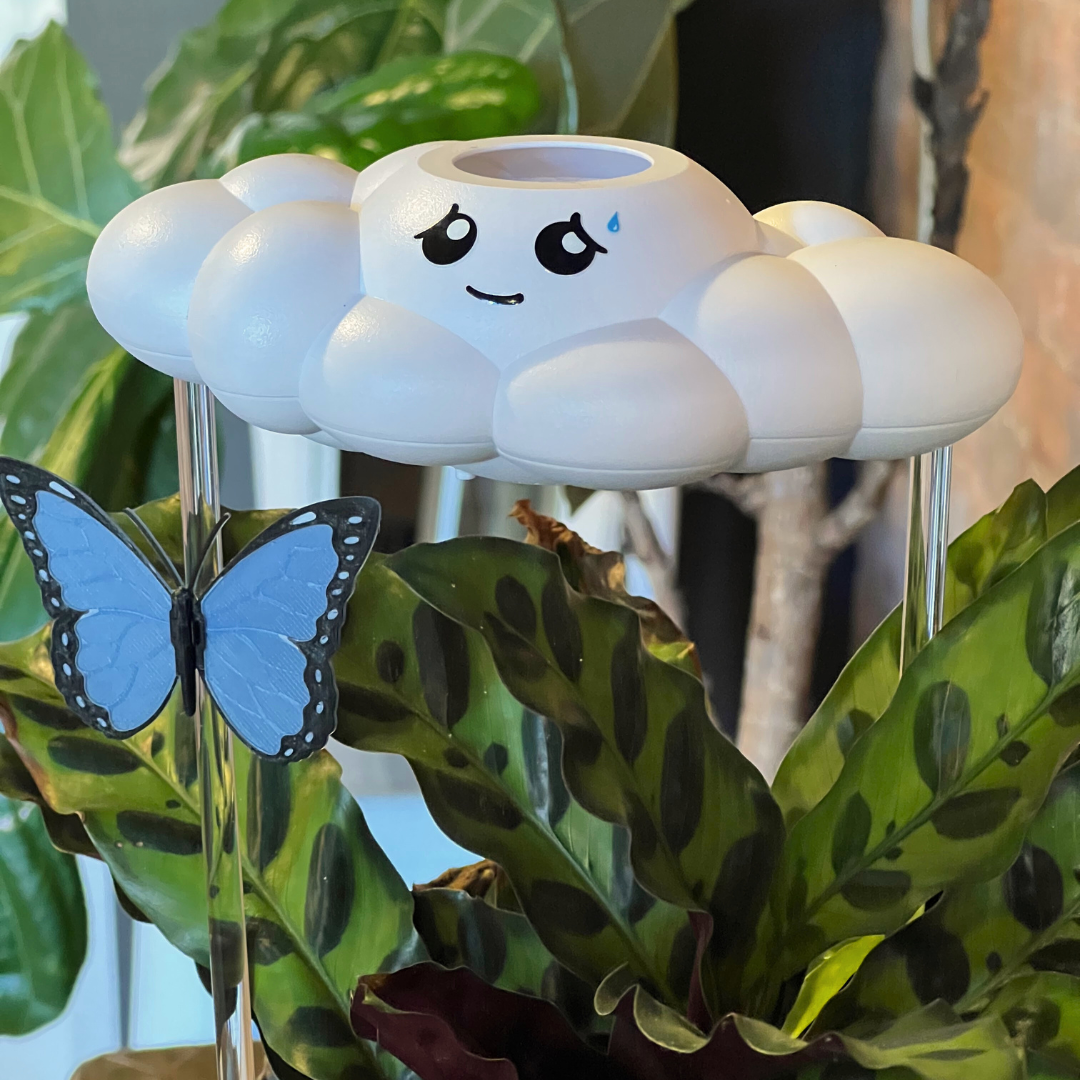 Cory the Cloud with blue butterfly charm