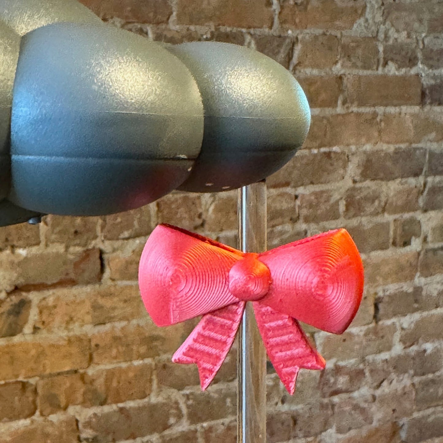 3D printed Bow Charm for THE CLOUD MAKERS dripping rain cloud