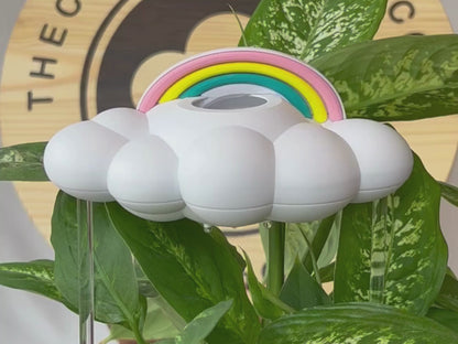 video of original dripping rain cloud with pastel rainbow